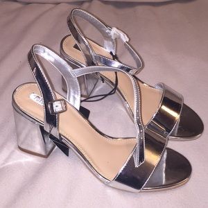 Heeled silver chrome sandels